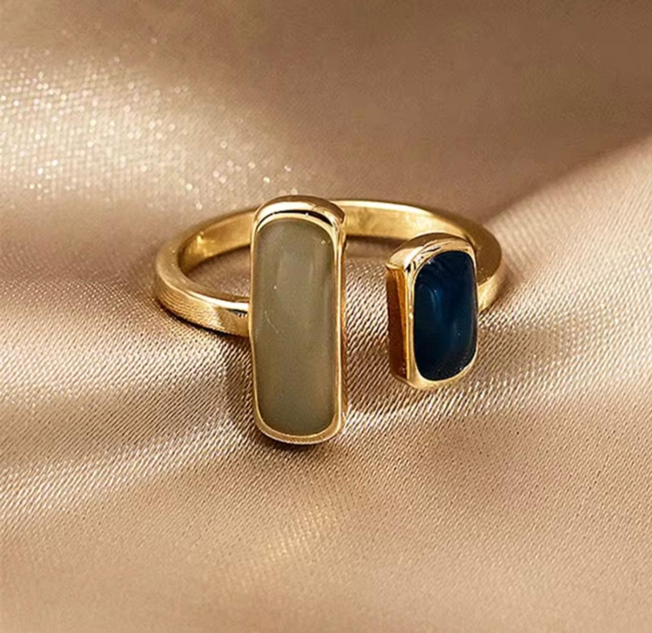 Gold-Tone Open Ring with Navy Blue and Grey Stone Accents