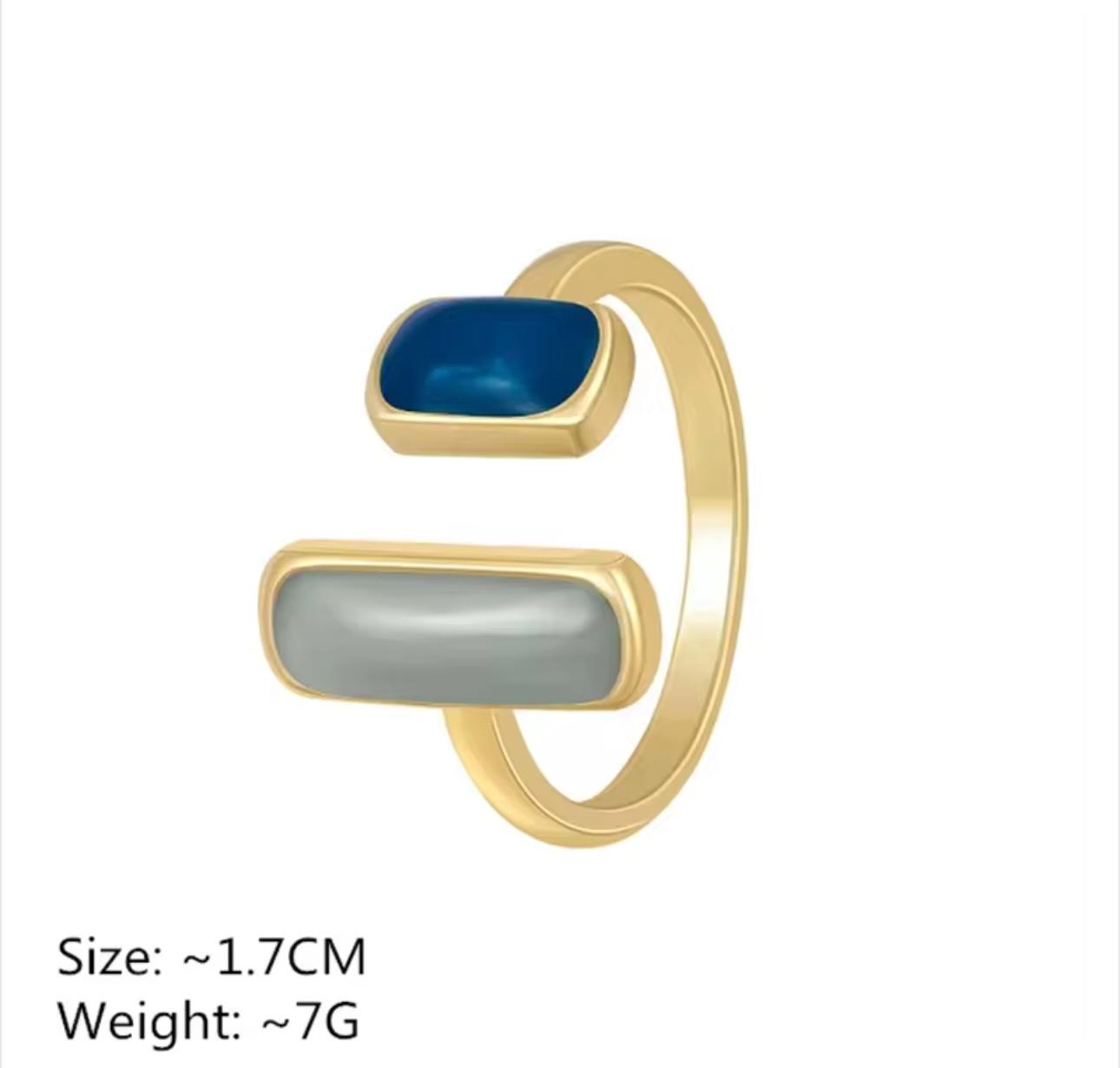 Gold-Tone Open Ring with Navy Blue and Grey Stone Accents
