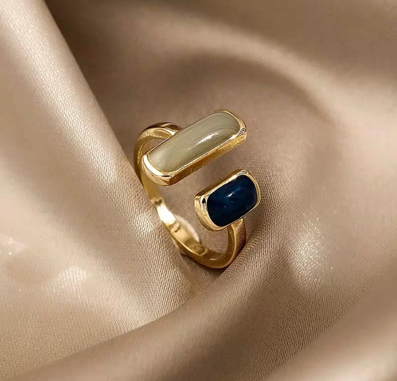 Gold-Tone Open Ring with Navy Blue and Grey Stone Accents